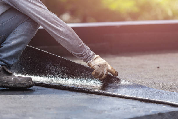 Professional Waterproofing technician working in Purcellville, VA